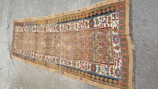 A lovely antique sarab rug with great colours. In used condition and a bit shaped but a beautiful early example,270x100,             