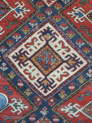 A great coloured south Caucasian long rug 19th century all good colour including cochineal. Approx 10ftx3ft6. Some corrosion bud good pile. Wonderful saturated colours.         