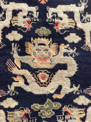   

 Here is a whimsical Tibetan Dragon sitting mat. Probably
 dating to the early 1900's or possibly earlier. The mat
 measures 24" X28" (61 cent. X 71 cent.) and is  ...