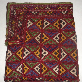 Here is a beautifull old Saryk Turkoman embroidered purse which
would have as likely been used to cary Tea Leaves as it would have
been used to carry money (tea is a very prized  ...