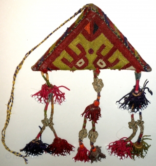 Here is a beautifull old Chodor Turkoman embroidered Talisman/Amulet which would have been worn to ward off evil/bring good luck. The talisman which apears to create one eyed burgandy spacemen in the  ...