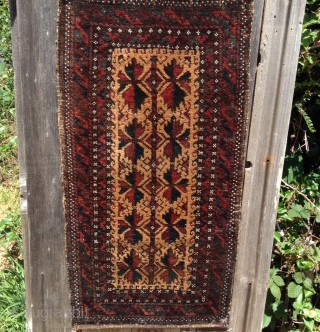 Here is a lovely camel hair field Baluch balisht dating to around 1870/1880. Measuring 19" x 38" the balisht face is in very good condition with mostly full pile. Deep rich colors  ...