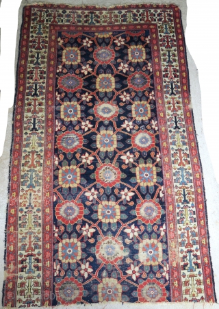 Monumental Northwest Persian Kurdish minakhani fragmented long rug. Size is 4'10"x8'2". Several blues and greens with aubergine. Bottom border missing.             