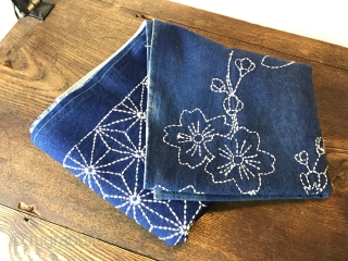 A beautiful antique room divider or entrance curtain (noren) with traditional ornamentation and cherry blossom motive in sashiko stitching. The fabric is in absolutely perfect condition and can be used without any  ...