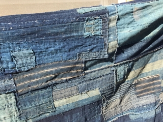 Highly desirable fabrics such as this one have become rare due to an ever larger demand in recent years. Made from various patches all in indigo blue, this piece is striking because  ...