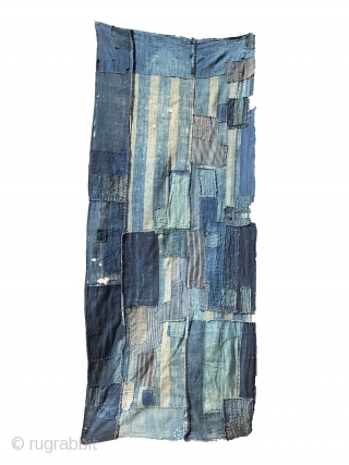 Highly desirable fabrics such as this one have become rare due to an ever larger demand in recent years. Made from various patches all in indigo blue, this piece is striking because  ...