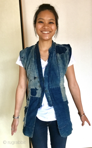 Neat little farmer's vest. Despite some holes, it is in good condition and could still be worn. The jacket is beautifully worn our be decades of physical labor on the rice fields  ...