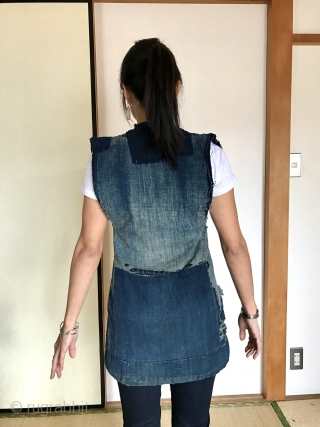 Neat little farmer's vest. Despite some holes, it is in good condition and could still be worn. The jacket is beautifully worn our be decades of physical labor on the rice fields  ...