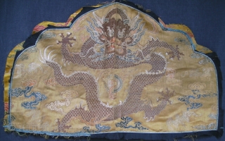 Rare fragment of a weaving for a semiformal imperial court robe, the 5 clawed dragon suggesting it was intended for the emperor or empress. Gold brocaded silk with a central Long among  ...