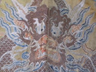 Rare fragment of a weaving for a semiformal imperial court robe, the 5 clawed dragon suggesting it was intended for the emperor or empress. Gold brocaded silk with a central Long among  ...