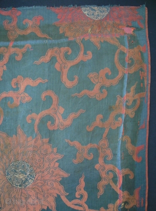 A large size panel of brocaded silk with a pattern of winding flowers. In the hearts of the flowers a climbing dragon. Late Ming or early Qing, ca. 1650. Full width with  ...