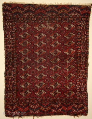 TEKKE small rug (wedding?). 41" x 53" from the 4th quarter of the 19th Century.  Missing a bit on both sides. Interesting primary side borders.One area (shown) that needs re-knotting. Glossy,  ...