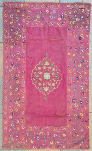 Beautiful Indian Silk embroidery ( Kujarat ) fragmentery transformed to a Summer carpet but it was probably a lrger bed cover as origin ! 
the center was added ( apliqued ) probably  ...