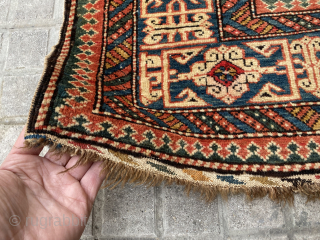 A very fine perepedil shirvan rug size 150x100 cm in very good condition with unusual kilims in the ends from both sides 
Dated 1319 Hijri
In the middle it shows a human riding  ...