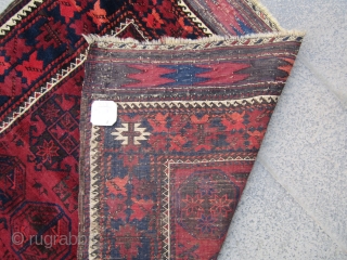 Old baluch natural colors.
19th the wool like velvet. there is a small place in the middle repair.
and also in the of one end of the kilim.185x90       