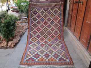 Old Qashqai kilim.19th.
Few places in borders found repair and smll repair in middle.
But good repair.in reality more beautiful than the pictures.
size 320x145.           