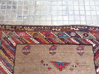 Rare Kurdish Antique Camel ground th1850 very good condition and full pile.
Size .225x125                    