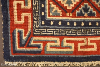 This is an antique Tibetan mat rug woven during the beginning of the 20th century circa 1900-1920 and measures 81x 68CM in size. its field is comprised of lattice design using geometric  ...