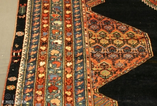 Antique Persian Kurdo Carpet, ca. 1920,

410 × 185 cm (13' 5" × 6' 0"),

Sign/Firma: Knoted by Taji Year 1318 AH ....... (Amal Taji, Sane 1318.....)        