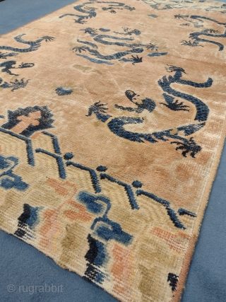 This is an antique Chinese Ningxia rug woven circa 19th century and it measures 172 x 110 in CM.Its design consists of five Dragons with five claws set on a nice color  ...