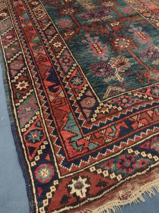 This is an Antique Turkish Doshmalti Rug woven circa 1900-1920 and it measures
163 × 112 cm (5' 4" × 3' 8"). It has a beautiful Geometric Design with nice saturated colors. A  ...