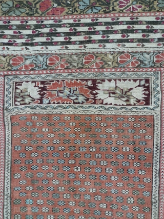 This is an antique Ghiordes Rug woven circa 19th century and it measures 175 x 130 in CM.It has a beautiful design with nice color pallette. Generally in a good condition.  