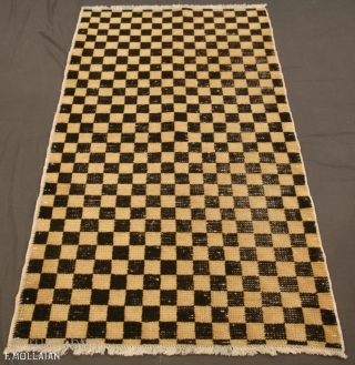 Antique Tibetan Rug, 1950-1970
135 × 80 cm (4' 5" × 2' 7")
                     