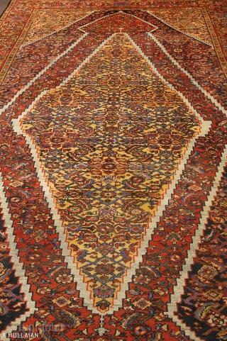 An antique Mahal carpet, West Persia, ca. 1900

The shaded indigo fiend with stylised polychrome herati design. Two rust-red and sandy-yellow large serrated medallions with similar design. Sandy-yellow herati spandrels. In rust red  ...