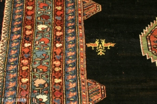 Antique Kurdo Carpet, ca. 1920,
410 × 185 cm (13' 5" × 6' 0"),

Sign/Firma: Knotted by Taji 1318 AH (Amal Taji, 1318.....)            