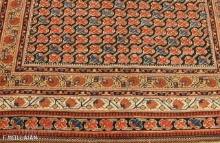 This is a Khamseh rug from southwest Persia and it was woven circa 1880. The field has been designed using an allover repeating flower design. The three borders are constructed using floral  ...