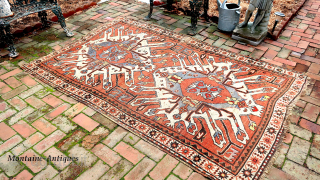 Caucasian Eagle Kazak- approx. 5 x 7.8.  Two open field ivory/blue medallions with iconic Cheleberd/Sunburst motifs. Circa late 19th/early 20th cent. Pile is low but even with some iron oxidation. Imperfections  ...
