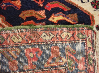 Bahktiari. 4 ft 5 inches by 6 ft 5 inches. Bold medallion rug with lots of ivory and great vivid color. Humans, birds, fish. Unusual green overcast on the sides appears to  ...