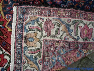 Bahktiari-- 5 ft 1  x 6 ft 10 inches. Lively and decorative with ivory border and lots of different colors.  Looks like there is foundation showing in the yellow in  ...