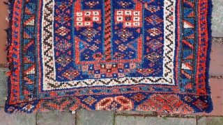 Kurd-- 20 x 23. Traditional Kurdish format with the piled strip at the bottom. Look at the flat weave work carefully. Wonderfully quirky tribal. Very interesting old  collector piece. But you  ...