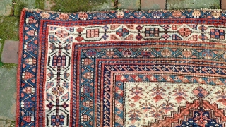 Kurd/Sauj Bulag-- 5 x 9.4. Main Carpet medallion piece with white corners. This rug has the sort of iconography you see in bags and smaller pieces. Very Interesting and decorative. CONDITION: A  ...