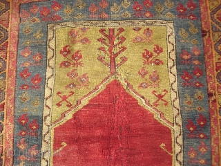 Old Anatolian-- approx 3 x 5. Possibly an antique Mudjar(?) And God knows how old. It looks ancient. Thick and floppy with really nice colors. What's going on in the middle? frayed  ...