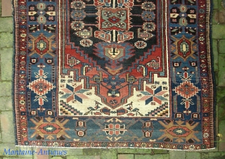 Bahktiari 4 ft 1 in x 5 ft 8 in. Beautiful old thing with knockout colors.  $20 UPS to Lower 48.  Check out recent finds @ http://www.montaine-antiques.com/oriental-rugs/    