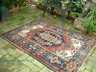 Bahktiari 4 ft 1 in x 5 ft 8 in. Beautiful old thing with knockout colors.  $20 UPS to Lower 48.  Check out recent finds @ http://www.montaine-antiques.com/oriental-rugs/    