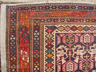 Kuba  4 ft x 7 ft 8 inches.  Antique thing in as-found condition with some fraying of the ends and sides. Interior is in very good and even condition with  ...