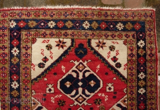 Turkish Pushti-- 2 ft 3 inches x 3 ft  4 inches. Interesting medallion design w/ Persian or Caucasian influence. Some inept old work securing one side cord which could easily be  ...