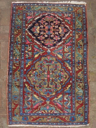 Heriz-- 2 ft 8 inches x 4 ft 8 inches. Rare small size and unusual design and very nice colors. Weave is good and fairly compact. Condition is pretty good tho not  ...