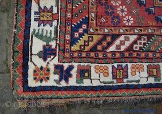 Luri? Qashqai? Afshar?  4 ft 5 inches by 9 ft 5 inches. Possibly late 19th century. It has silvery goat hair warps. That design in the medallion is a Qashqai thing.  ...