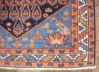 W.Persian Village -- 4 ft 6 x 6 ft 6 inches. Old, soft, floppy rug w/ botehs and sky blue corners. Blue weft is a clue to village origin. Pretty decent condition  ...