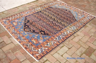 W.Persian Village -- 4 ft 6 x 6 ft 6 inches. Old, soft, floppy rug w/ botehs and sky blue corners. Blue weft is a clue to village origin. Pretty decent condition  ...