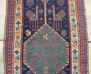 Northwest runner  3 ft 0 by 15 ft. Maybe Caucasian  with the birds and all that Shirvan stuff. I'm not sure. Maybe 19th century. Warp is cotton. Pretty nice condition.  ...