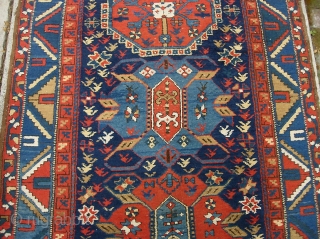 Old Azerbeijan runner  3 ft 6 by 14 ft. Wool foundation and might have been woven either side of the border.  Looks 19th century to me. Pretty nice condition. Shows  ...