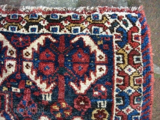 Basiri(?)-- 26 x 28 inches. We acquired a pile of small tribal rugs. All as-found. I will post 6 per day until they are gone.

Some Khamsa motifs but I'm not sure. Let's  ...