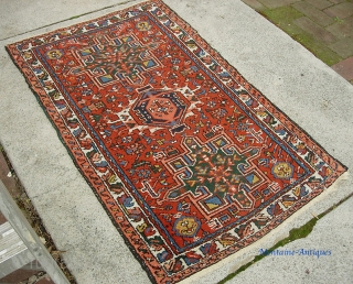 Old Karaja. Hard to find mat size: 2 ft 4 x 3 ft 11 inches.  Pile is low but even with just a smattering of foundation showing in one small area. 