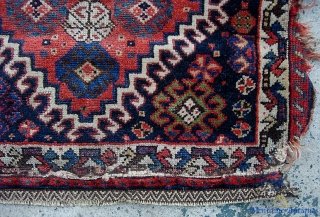 Qashqai 21 inches by 23 inches. Ancient little rug. Rough but still beautiful $12 to ship in usa.               