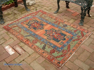 Ancient N.W. Bahkshaish? Karaja? Serapi? 3 ft 4 inches by 4 ft 7 inches. 19th century. The warps are a candy-cane with cotton and brown wool. Condition is low, even, w/ some  ...